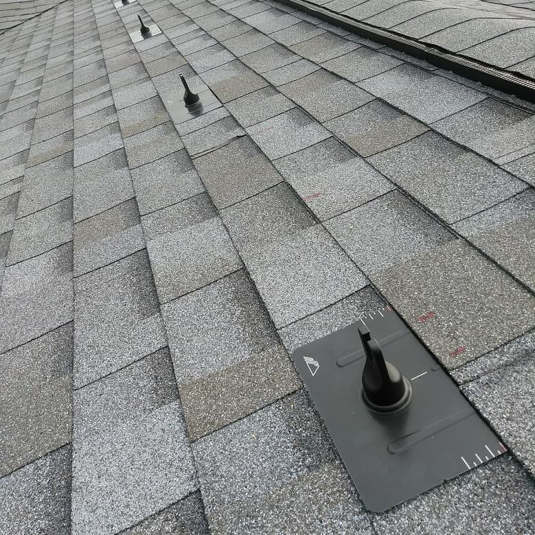 Solar panel mounting rails and roof mounts before panels are placed